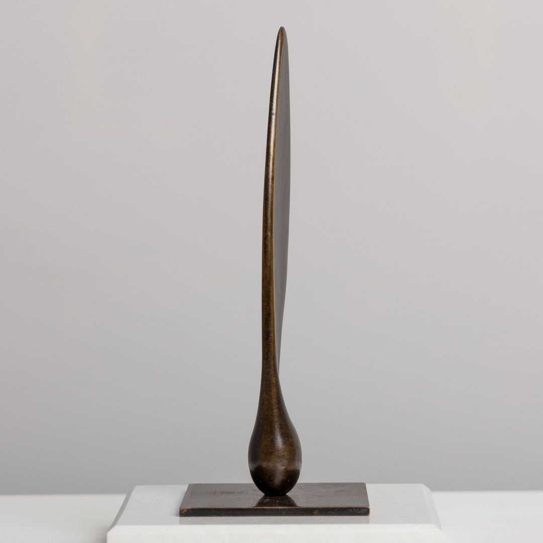 Patinated bronze Sycamore Seed sculpture by James Parker, with an elongated wing-like form, subtle torsion and a sense of suspended movement.