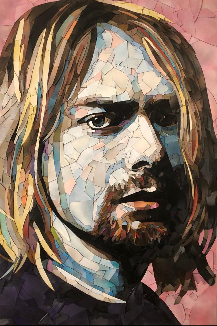 Ed Chapman mosaic portrait of Kurt Cobain crafted entirely from broken vinyl records, with layered shards forming a striking likeness of the Nirvana frontman against a soft pink background.