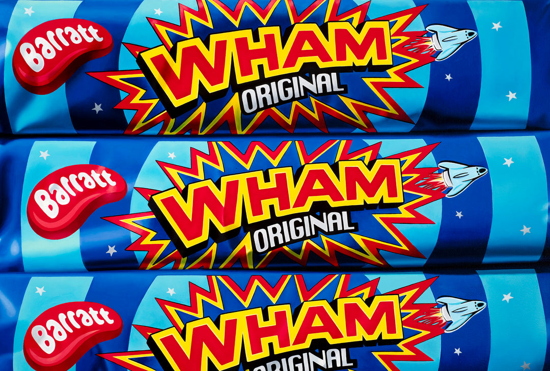 Kelly-Anne Davitt Wham Wham Wham hyperreal oil painting on canvas depicting stacked Barratt Wham Original sweet bars with glossy blue wrappers and bold red and yellow graphics.
