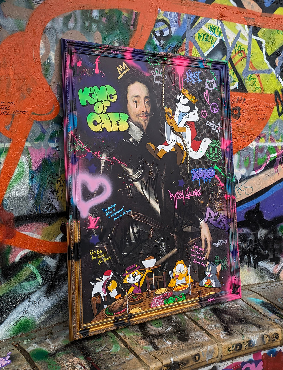"King of Cats" original painting by KiPS – a playful mixed media composition blending a classical portrait of King Charles I with vibrant graffiti, cartoon cats like Felix, Garfield, Tom, and Top Cat, set against a digitally enhanced background with spray paint, text overlays, and pop culture motifs.