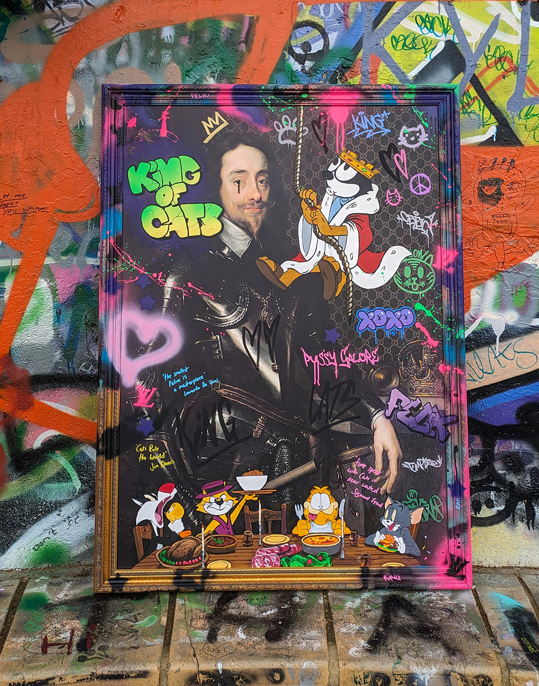 "King of Cats" original painting by KiPS – a playful mixed media composition blending a classical portrait of King Charles I with vibrant graffiti, cartoon cats like Felix, Garfield, Tom, and Top Cat, set against a digitally enhanced background with spray paint, text overlays, and pop culture motifs.