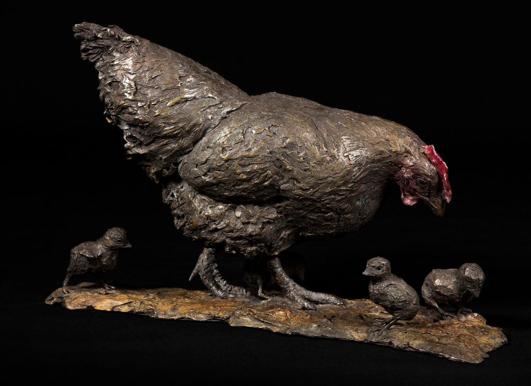 Bronze sculpture of a mother hen with textured feathers, surrounded by four chicks on a naturalistic base