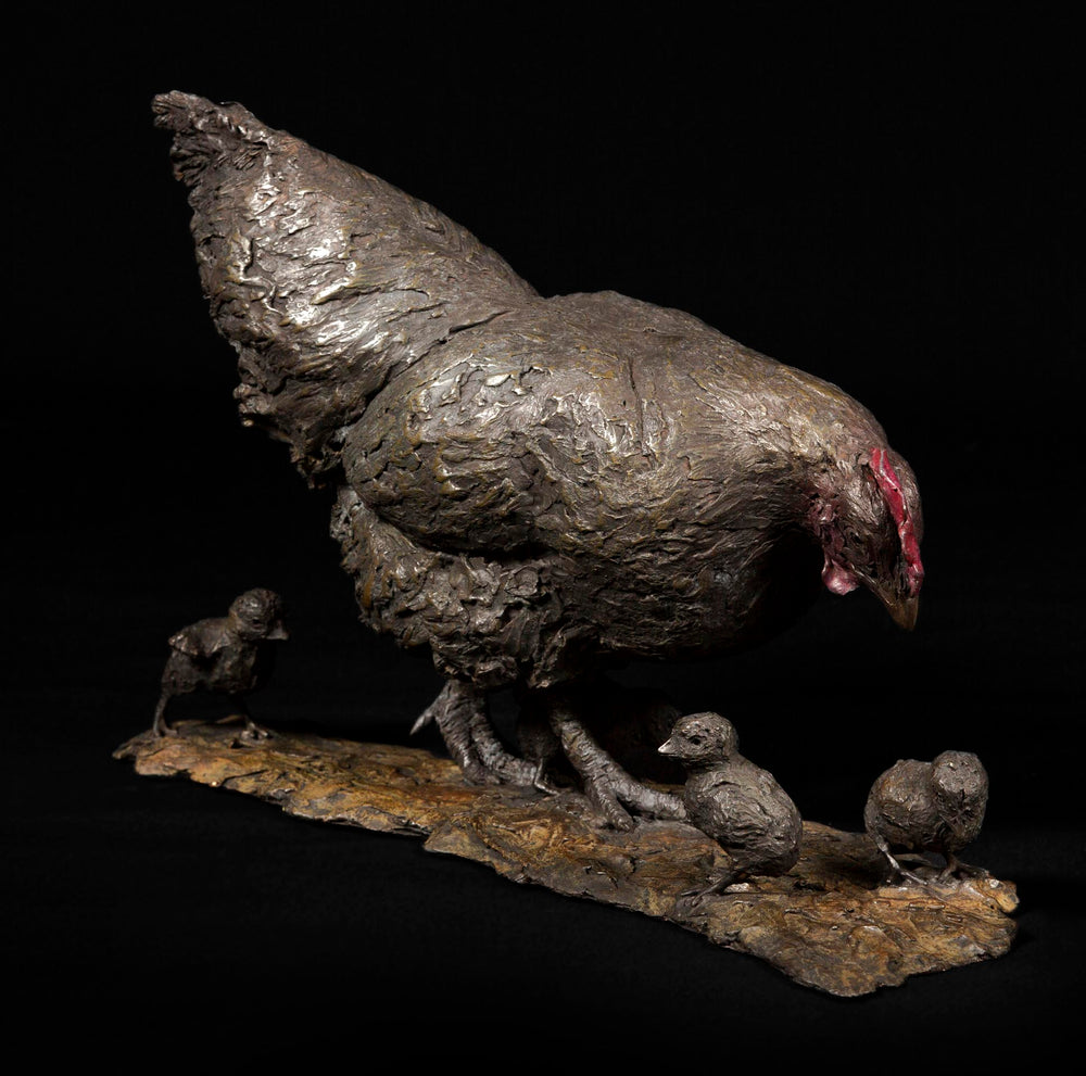 Bronze sculpture of a mother hen with textured feathers, surrounded by four chicks on a naturalistic base