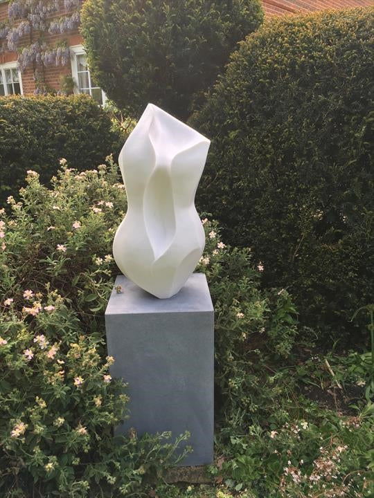 Lucy Unwin marble sculpture Primavera, hand carved from white Statuary Carrara marble, featuring an elegant contemporary abstract form inspired by the curves of the female body and organic forms found in nature.