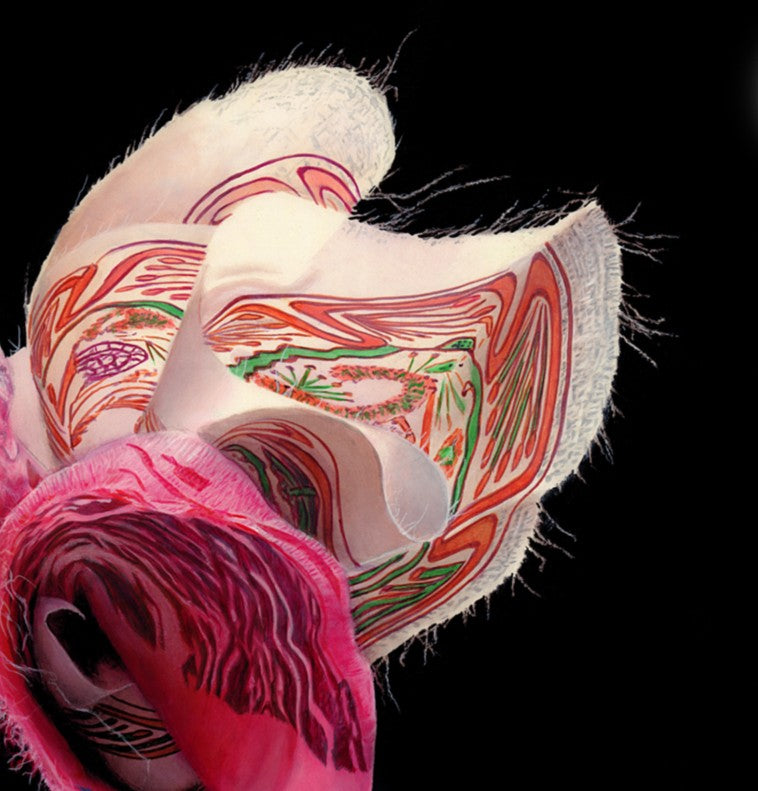 A hyperrealistic acrylic painting of intricately folded, vivid textile forms resembling an abstract flower. The fabric, designed by Dame Zandra Rhodes, bursts with dynamic pinks, reds, blues, purples, and whites, featuring layered patterns and frayed edges, set against a deep black background.