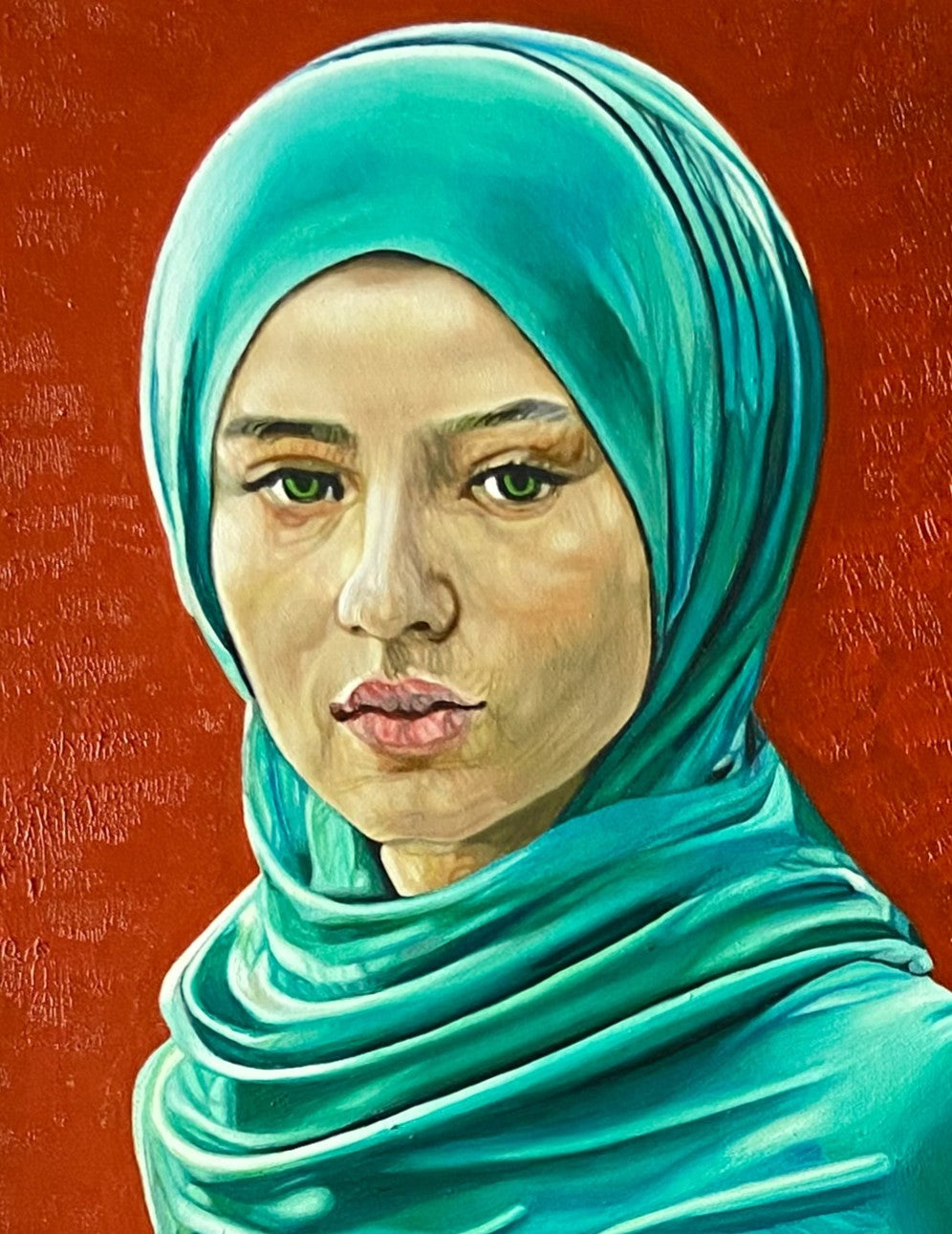 Oil painting by Dide Siemmond depicting a woman in a flowing turquoise and emerald-green dress and headscarf against a richly textured deep red background. Rendered with precise realism, her calm, direct gaze is framed by luminous fabric that wraps and folds around the body, catching light and creating subtle transparency. The contrast between cool green garments and the warm red ground gives the portrait quiet intensity, blending contemporary figurative painting with layered conceptual symbolism.