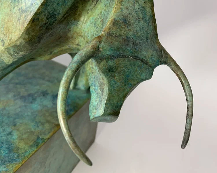 Marie Ackers Le Taureau bronze bull sculpture with striking green patina, poised in a powerful forward stance on a fabricated bronze base. Limited edition of 8, signed, numbered, and foundry stamped with certificate of authenticity.