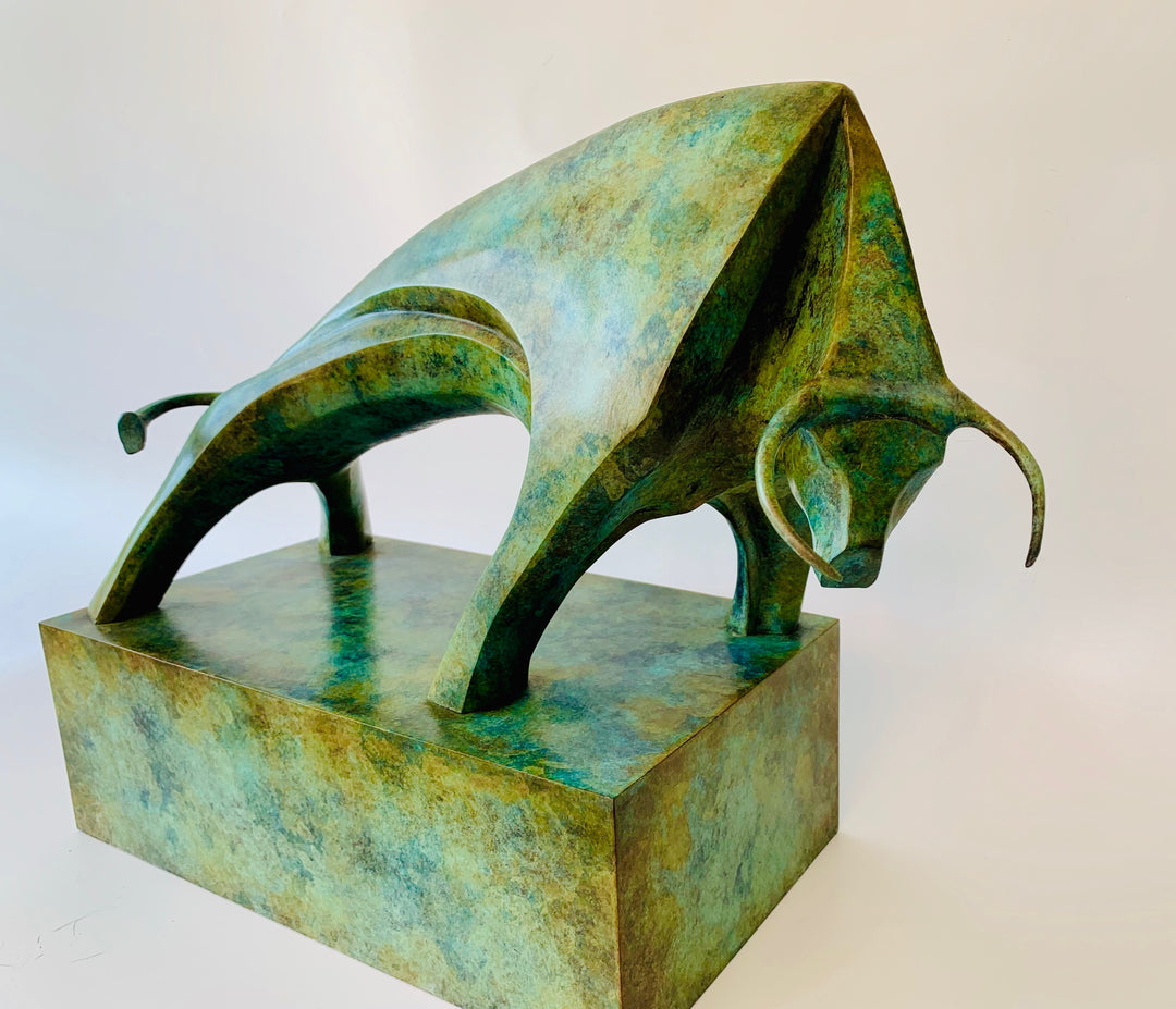 Marie Ackers Le Taureau bronze bull sculpture with striking green patina, poised in a powerful forward stance on a fabricated bronze base. Limited edition of 8, signed, numbered, and foundry stamped with certificate of authenticity.