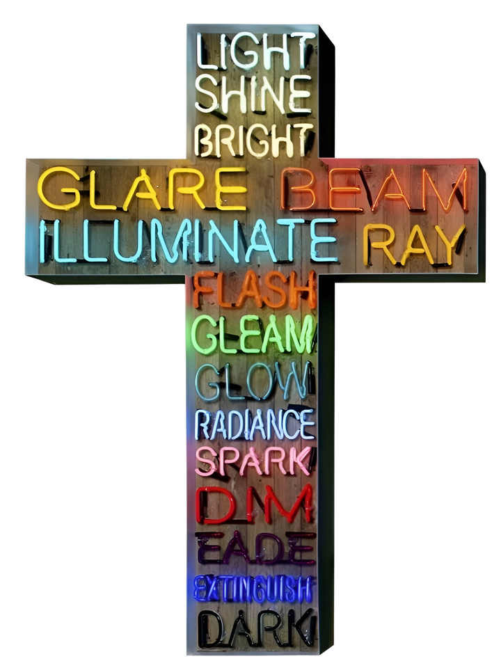 Neon artwork in the shape of a cross by Matthew Bracey, featuring a cascading list of light-related words, from “LIGHT” and “SHINE” at the top to “DARK” and “EXTINGUISH” at the base. Each word is rendered in glowing neon across a spectrum of colours including white, yellow, red, orange, green, blue, pink, and black, mounted on a wooden backdrop.