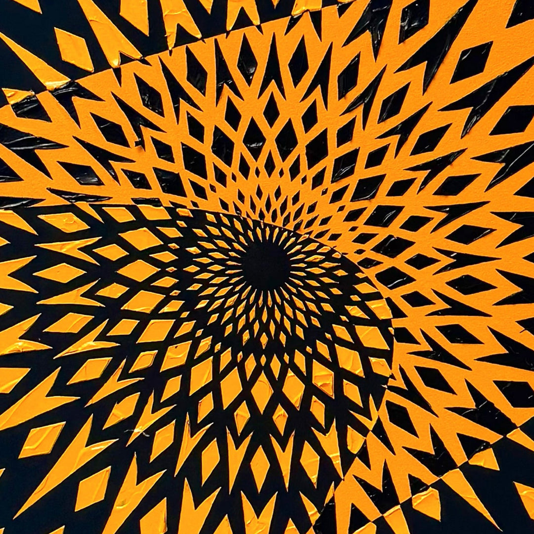 High-impact circular wall artwork by Mike Philp featuring sharp orange geometric forms radiating from the centre against a dark ground. Inspired by Formula 1, the composition expresses speed, precision, and engineered motion.
