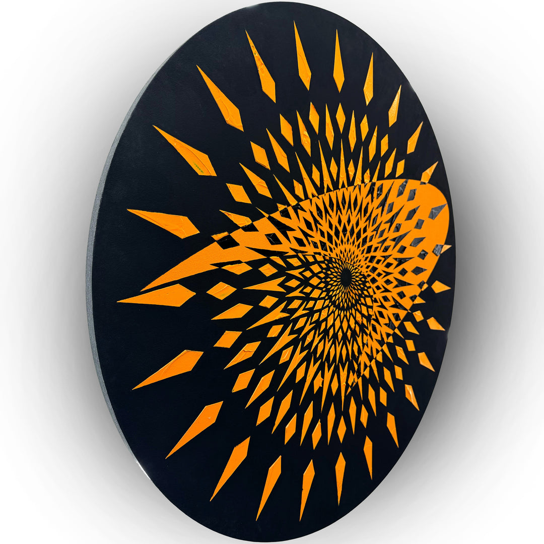 High-impact circular wall artwork by Mike Philp featuring sharp orange geometric forms radiating from the centre against a dark ground. Inspired by Formula 1, the composition expresses speed, precision, and engineered motion.