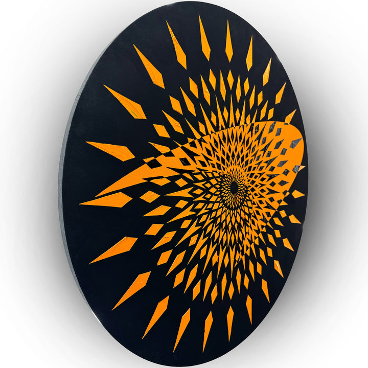 High-impact circular wall artwork by Mike Philp featuring sharp orange geometric forms radiating from the centre against a dark ground. Inspired by Formula 1, the composition expresses speed, precision, and engineered motion.