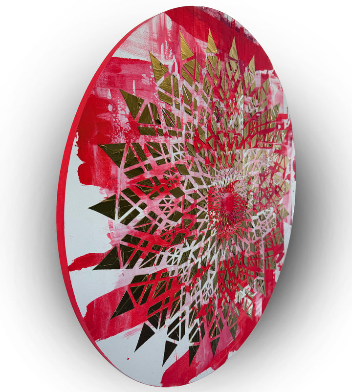 Large circular wall artwork by Mike Philp inspired by Formula 1, combining layered magenta tones with sharp gold geometry. The radial composition conveys speed, rhythm, and controlled energy with bold graphic impact.