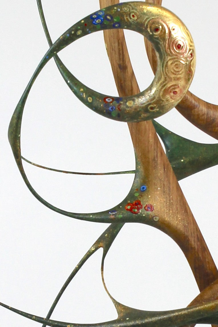 How Was I to Know by Mark Purllant, a one-off mixed media sculpture in carved English brown oak with intertwining flowing forms, enriched with painted details and 23ct gold leaf accents, evoking Gustav Klimt’s decorative influence.