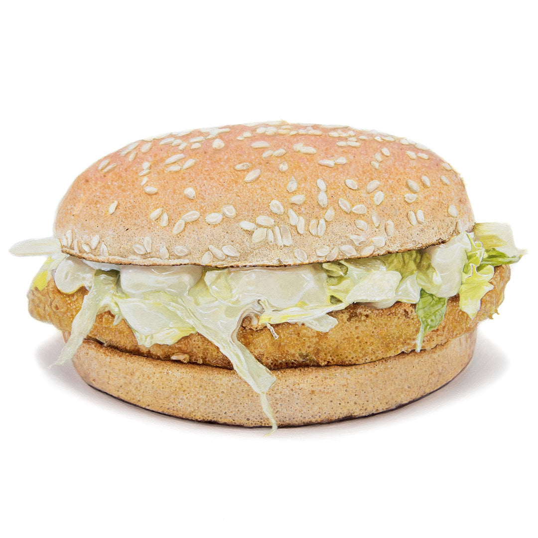 Simon Taylor, McChicken® Sandwich, oil on linen, 35 x 35cm – hyperrealistic painting of a sesame seed bun filled with coated chicken patty and pale green iceberg lettuce, set against a clean white ground.