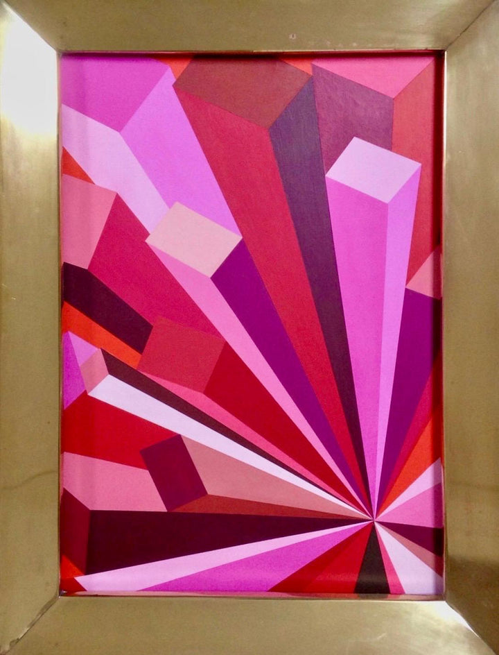 Rob Wyn Yates Metropolis – geometric abstract painting in vivid shades of pink, red, burgundy, and magenta, radiating from a central point with bold angular forms, set in a polished 1970s brass frame.