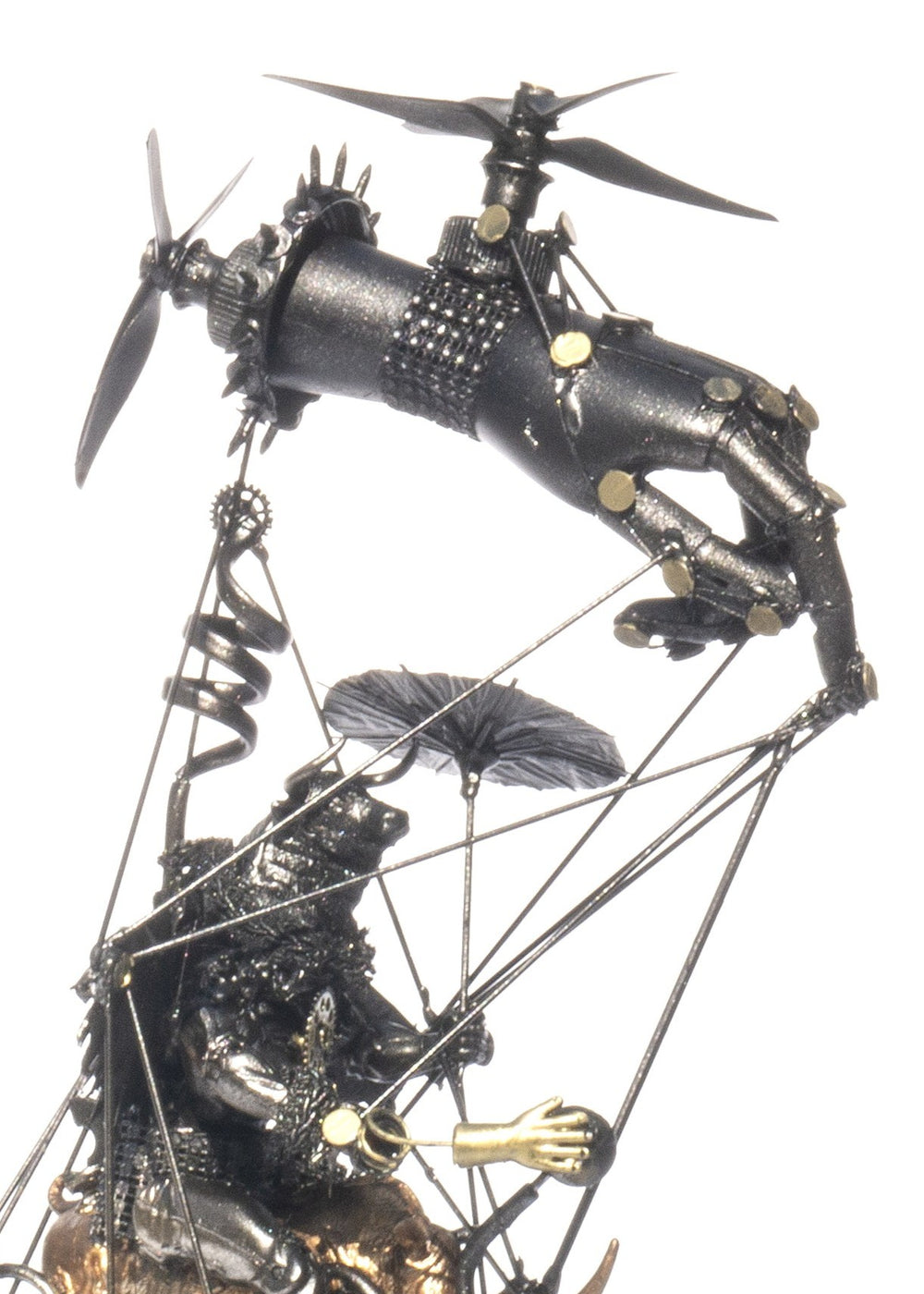 “Minotaur’s Homage to Dürer” by Andrew Stevens – a one-off steampunk sculpture created from recycled toys, metal, and engine parts. Features a winged Minotaur atop mechanical gears and bronze figures, finished in dark patina with fine industrial detail.
