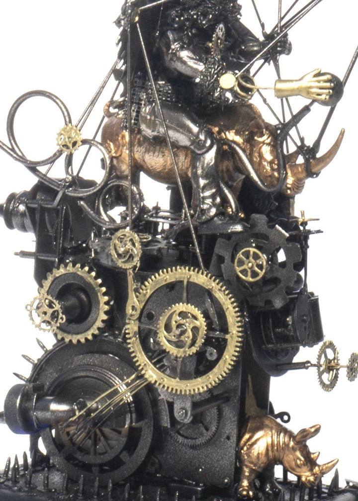“Minotaur’s Homage to Dürer” by Andrew Stevens – a one-off steampunk sculpture created from recycled toys, metal, and engine parts. Features a winged Minotaur atop mechanical gears and bronze figures, finished in dark patina with fine industrial detail.