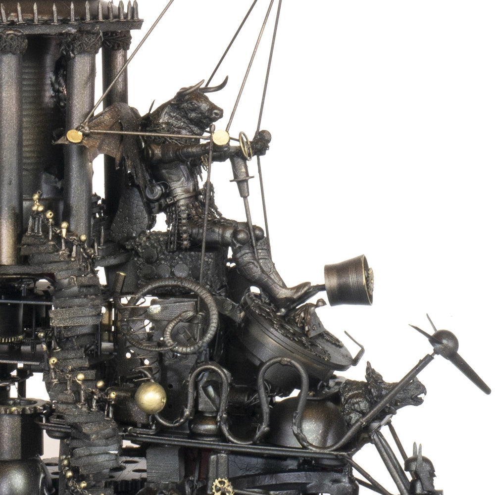 “Minotaurs’ Mobile Home” by Andrew Stevens – a one-off steampunk sculpture crafted from recycled metal, toys and wood. Featuring winged Minotaur figures amid gears and domed structures, finished in dark bronze patina with intricate mechanical detail.