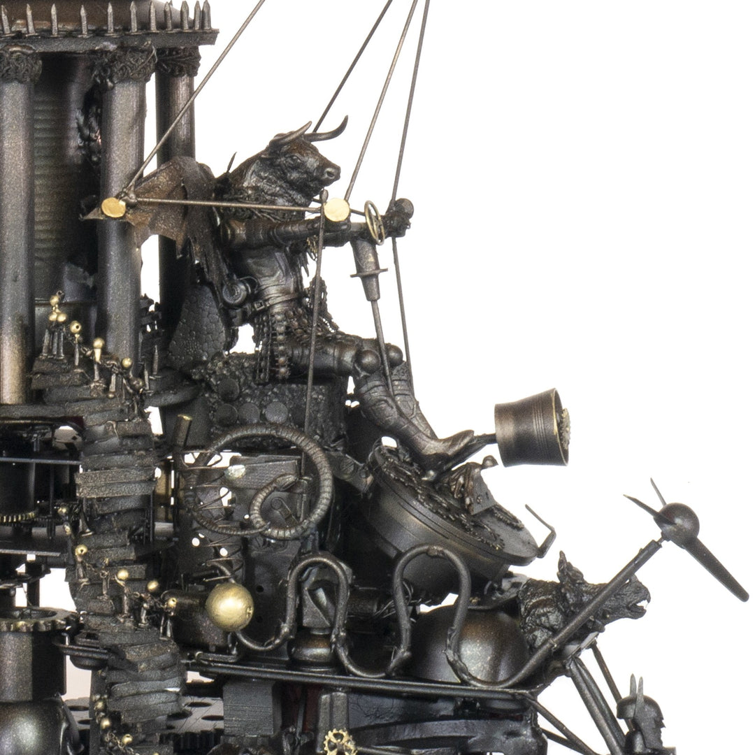 “Minotaurs’ Mobile Home” by Andrew Stevens – a one-off steampunk sculpture crafted from recycled metal, toys and wood. Featuring winged Minotaur figures amid gears and domed structures, finished in dark bronze patina with intricate mechanical detail.