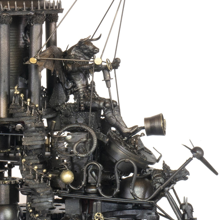 “Minotaurs’ Mobile Home” by Andrew Stevens – a one-off steampunk sculpture crafted from recycled metal, toys and wood. Featuring winged Minotaur figures amid gears and domed structures, finished in dark bronze patina with intricate mechanical detail.