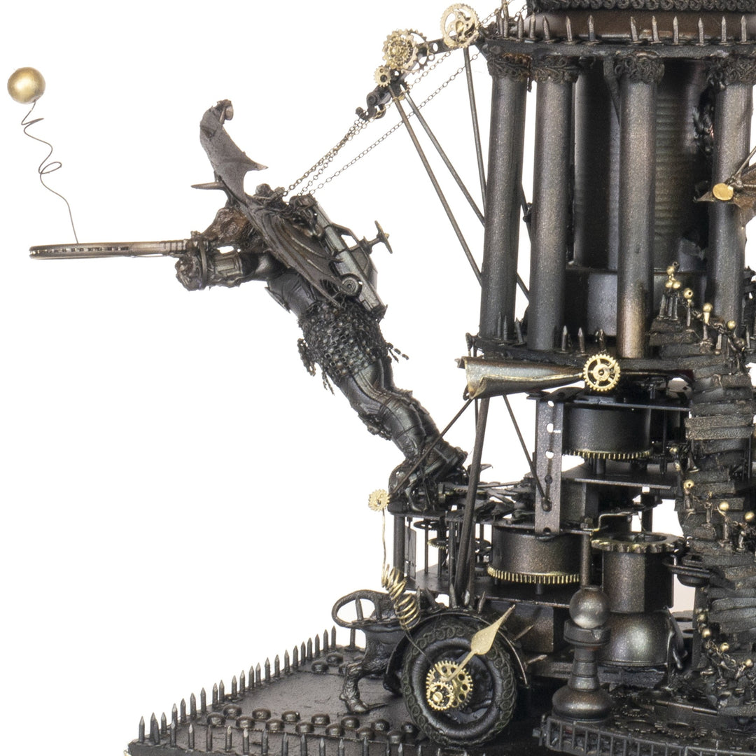 “Minotaurs’ Mobile Home” by Andrew Stevens – a one-off steampunk sculpture crafted from recycled metal, toys and wood. Featuring winged Minotaur figures amid gears and domed structures, finished in dark bronze patina with intricate mechanical detail.