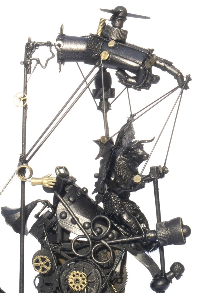 “Minotaurs and the First Electric Car” by Andrew Stevens – a one-off steampunk sculpture crafted from recycled materials, gears, and engine parts. Features winged Minotaur figures within a mechanical structure finished in bronze patina.