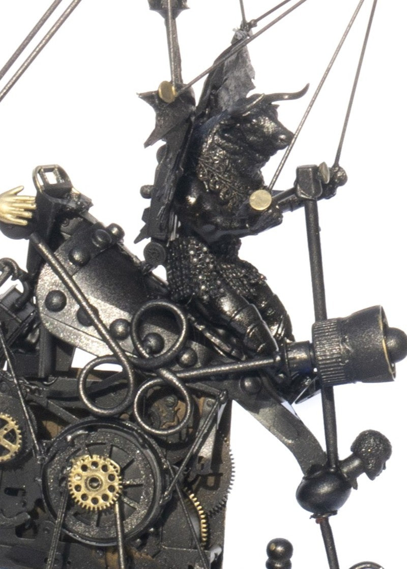 “Minotaurs and the First Electric Car” by Andrew Stevens – a one-off steampunk sculpture crafted from recycled materials, gears, and engine parts. Features winged Minotaur figures within a mechanical structure finished in bronze patina.