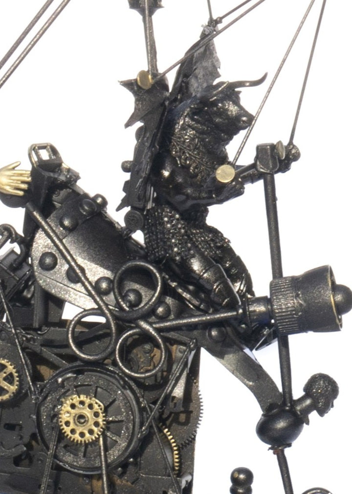 “Minotaurs and the First Electric Car” by Andrew Stevens – a one-off steampunk sculpture crafted from recycled materials, gears, and engine parts. Features winged Minotaur figures within a mechanical structure finished in bronze patina.
