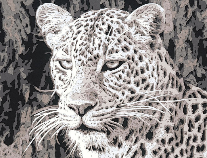 Hand-cut paper artwork of an African leopard poised on a tree branch, its dappled coat rendered in layered tones of ivory, taupe, and soft grey. Precision-cut detailing captures the feline’s quiet strength and poise, framed in black wood with UV-protective art glass.