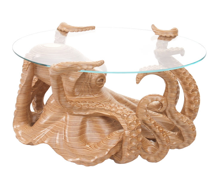 Hand-carved birch plywood octopus coffee table by Bill Prickett with sculptural tentacles supporting a low iron toughened glass top, combining functional furniture with detailed contemporary wood sculpture.