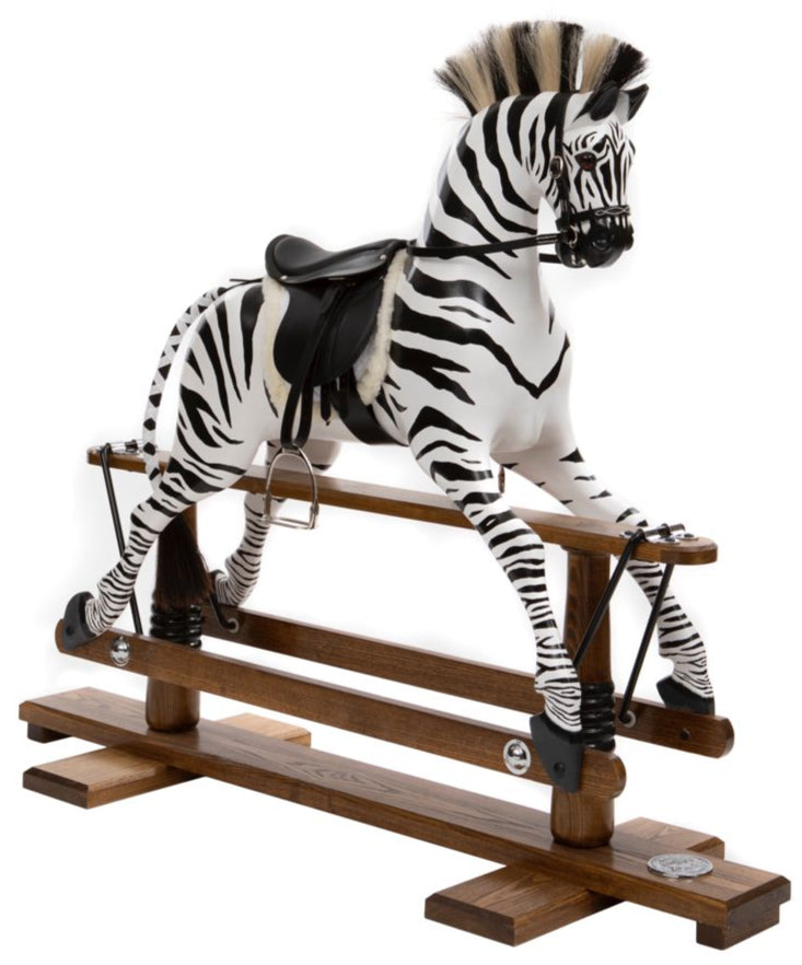Hand-painted wooden rocking zebra with black leather saddle, mounted on a dark oak safety stand.


