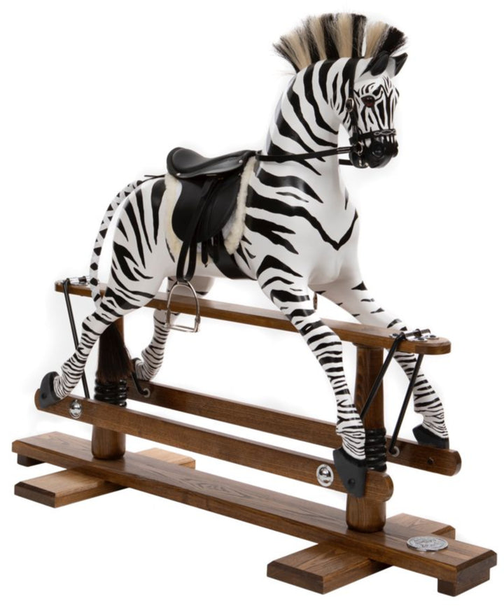 Hand-painted wooden rocking zebra with black leather saddle, mounted on a dark oak safety stand.

