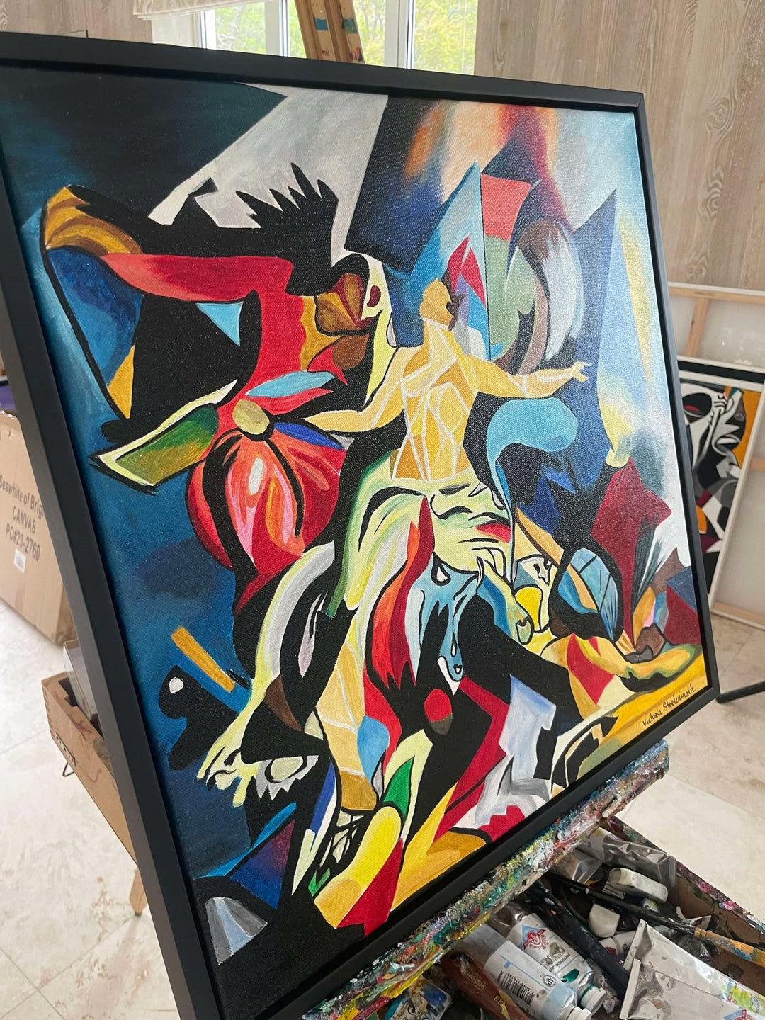 Abstract expressionist painting with vivid colours, human and horse figures in motion.

