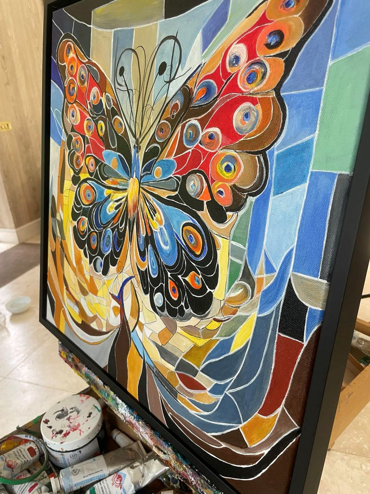 Abstract painting of a vibrant butterfly with patterned wings in red, blue, and orange tones, set against a mosaic-style background.

