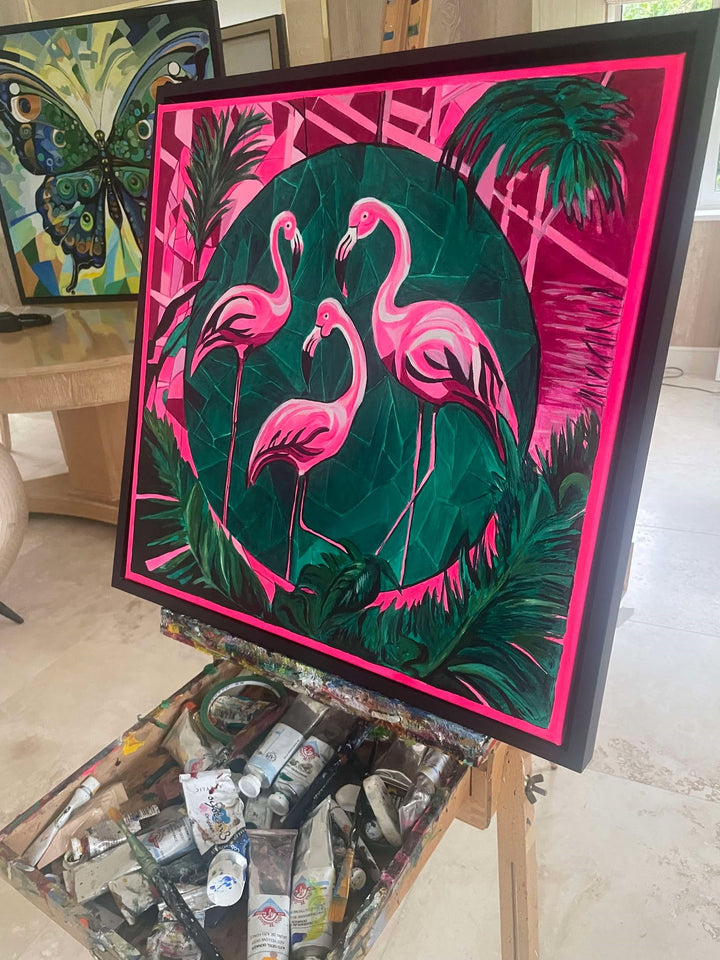 Bold contemporary painting of three pink flamingos set against a geometric green and magenta jungle backdrop.