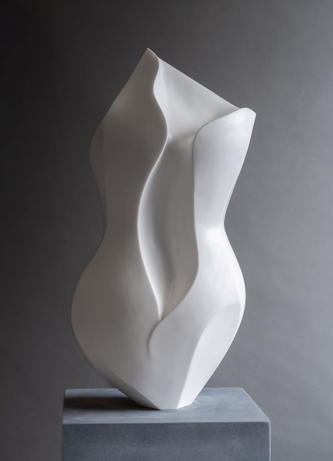 Lucy Unwin marble sculpture Primavera, hand carved from white Statuary Carrara marble, featuring an elegant contemporary abstract form inspired by the curves of the female body and organic forms found in nature.