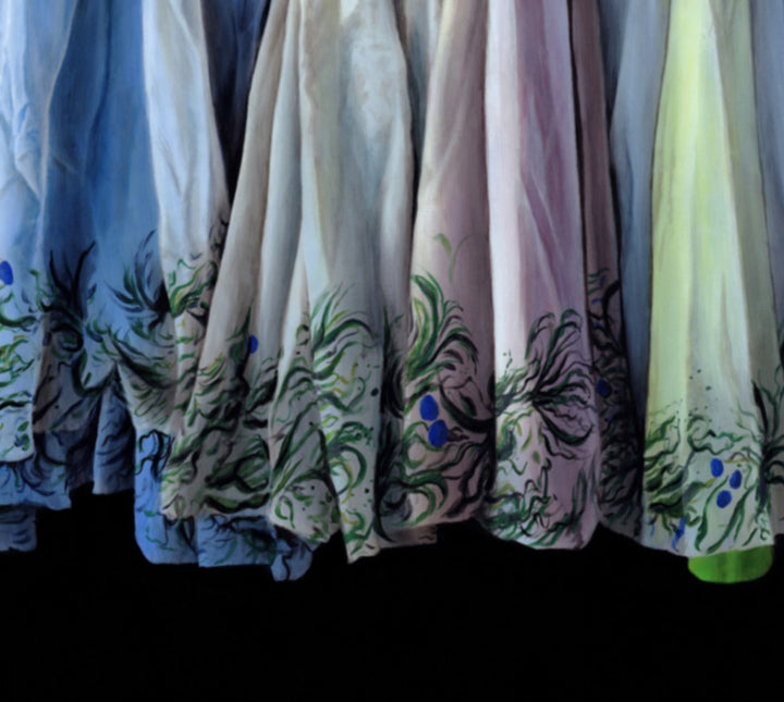 Hyperrealist painting of a row of traditional ballet costumes, intricately detailed with floral embroidery and soft pastel hues. The garments hang closely together, creating a sense of harmony, movement, and shared elegance. The composition reflects the artistry of stage costume and the beauty of performance preparation.