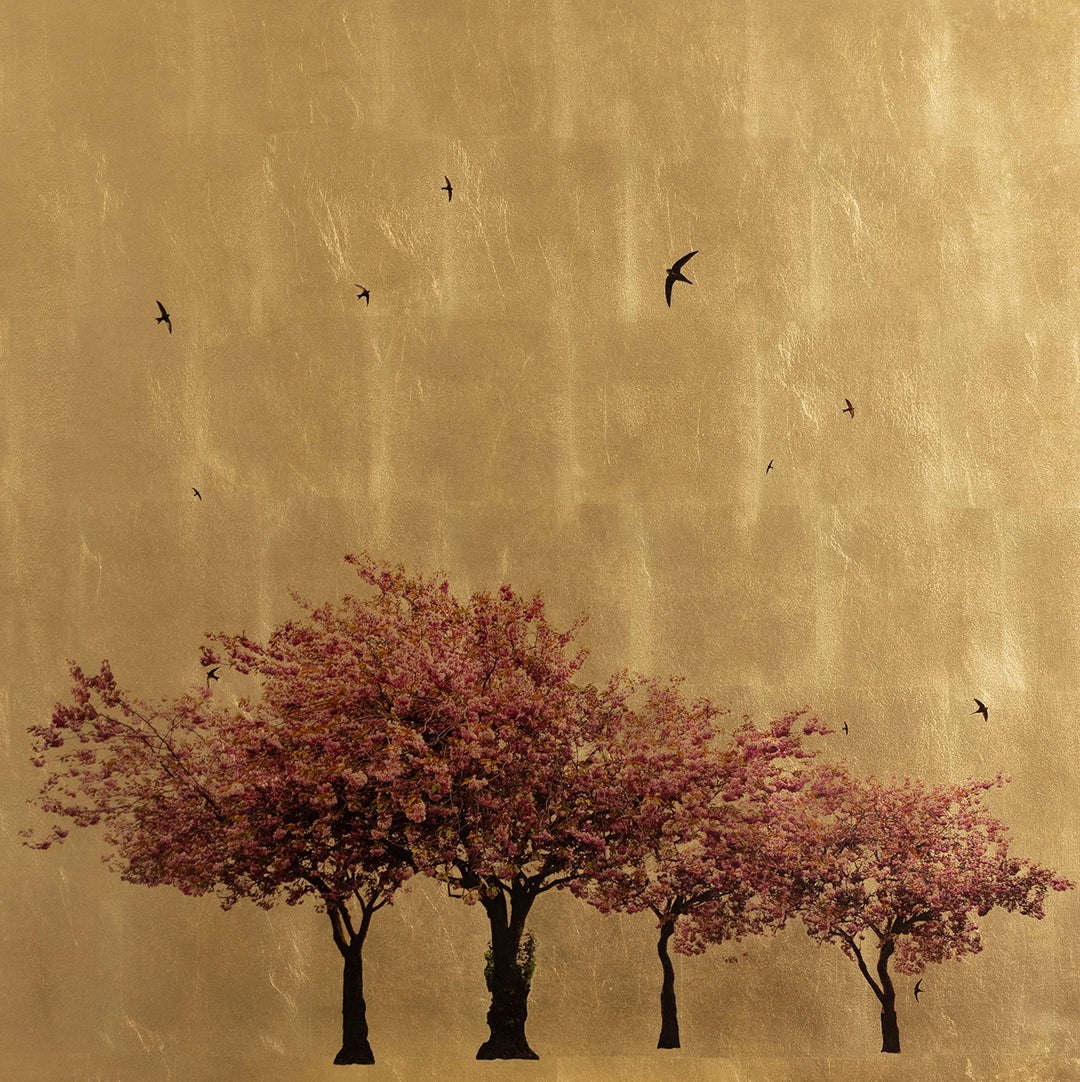 Close-up of Robert Pereira Hind’s Prunus Serrulata In Excelsis IV, showing a single Japanese cherry tree in full pink blossom with swifts in flight against a shimmering gold-leaf background. Created with acrylic paint and organic photographic pigment on gilded wooden panel, finished with shellac and art glazes, designed to naturally patinate over time.