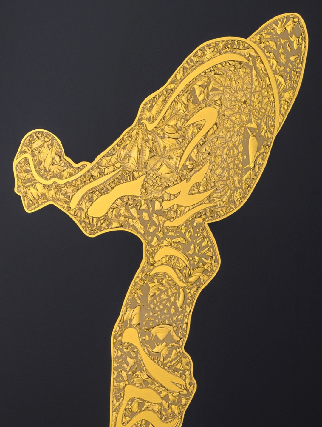 ‘Golden Spirit’ by Vince Edmunds, a handcrafted Rolls-Royce automotive artwork depicting the iconic Spirit of Ecstasy bonnet mascot in genuine 24-carat gold leaf and 22.5-carat champagne gold leaf on glue-chipped glass. The flowing, wing-like figure features intricate crystalline gold textures, rising from an ornate champagne-gold pedestal against a deep black background. Presented in a satin black frame with a fine gold sight line, celebrating the historic Rolls-Royce Flying Lady emblem.