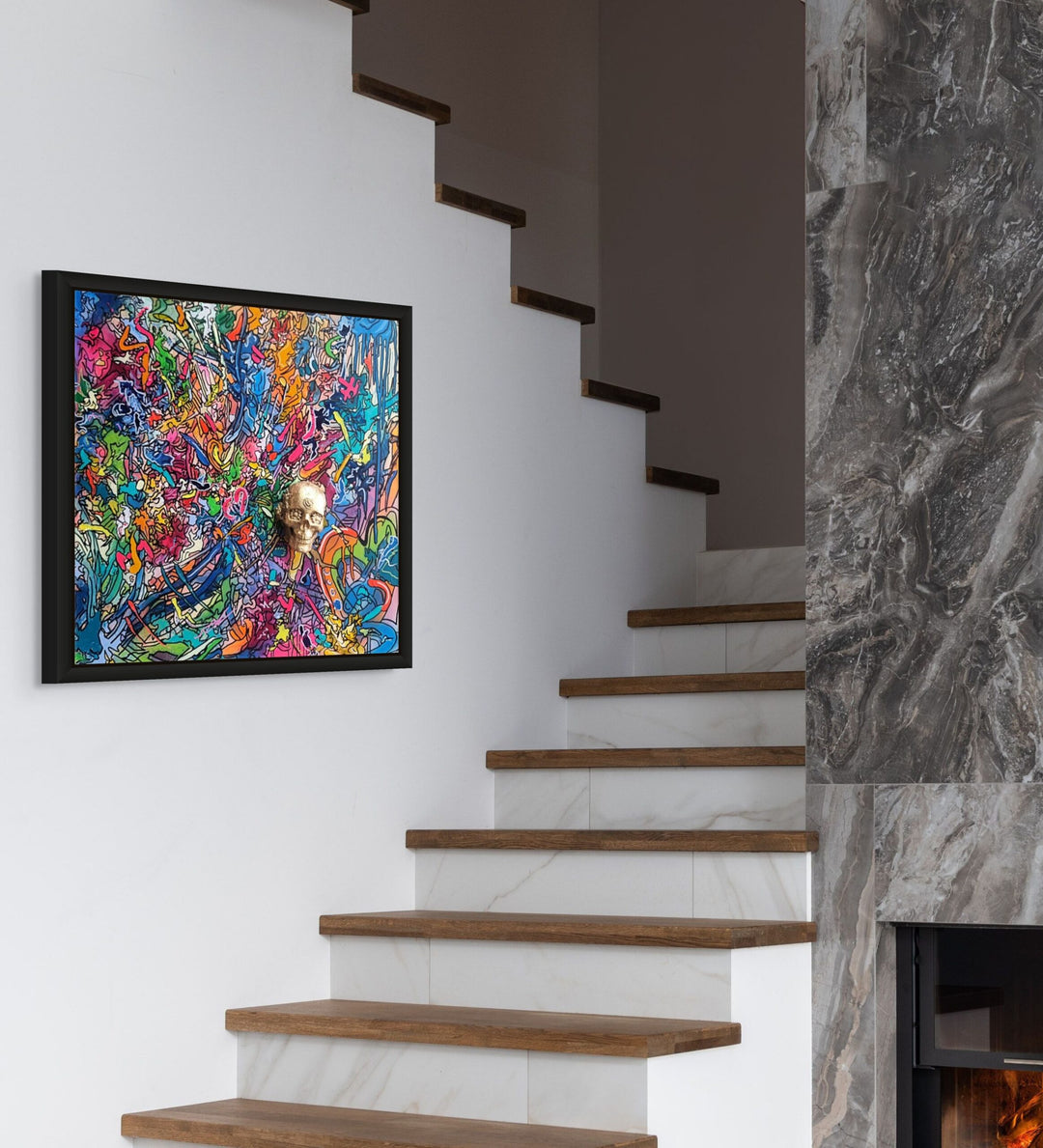 A vibrant abstract artwork filled with layered graffiti-style lines, bold colours and energetic mark-making, centred around a gold 3D skull emerging from the canvas.