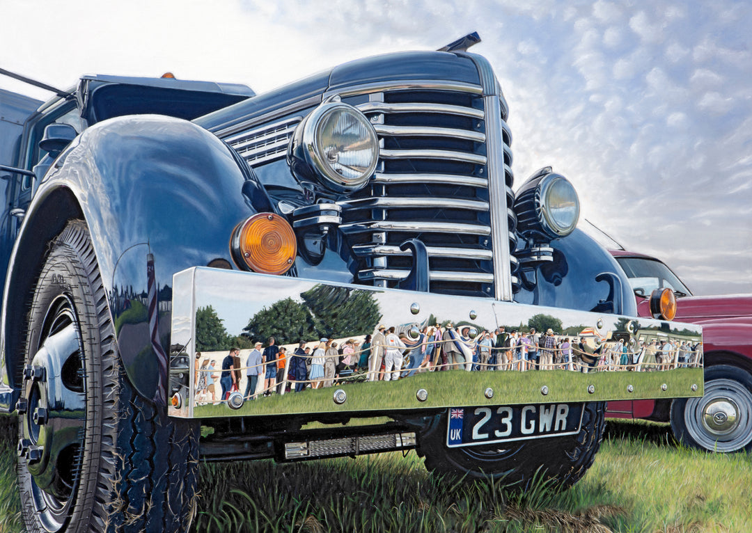 Limited edition giclée print by Ray West featuring a hyper-realistic pastel artwork of a vintage truck at Goodwood, with spectators reflected in the polished chrome bumper, capturing light, depth and detail, reproduced on archival quality fine art paper.