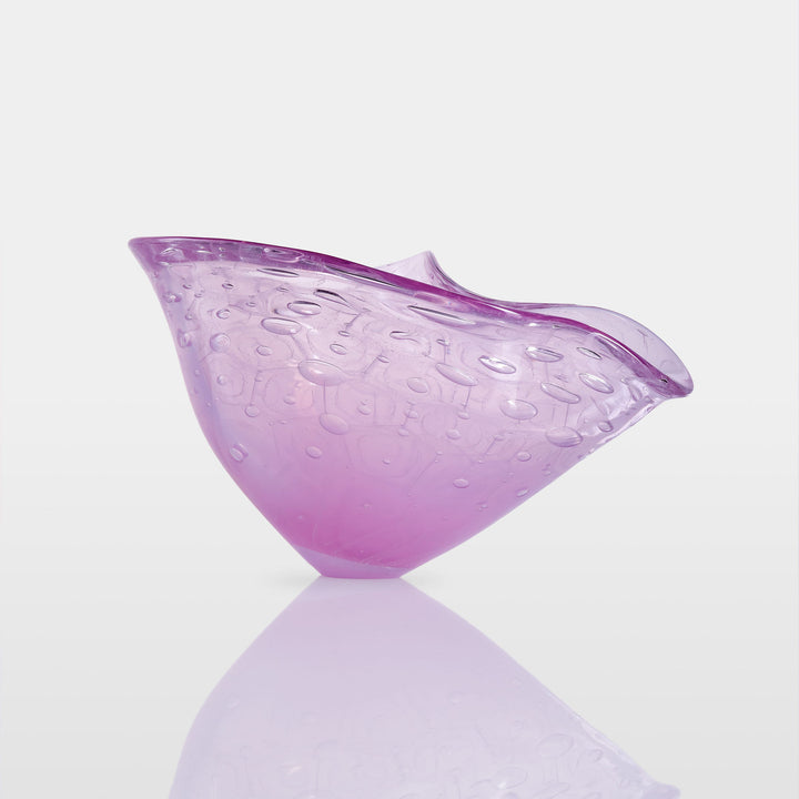 Delicately shaped lilac glass vessel with an organic rim and embossed bubble-like texture, set against a white background with soft reflection.
