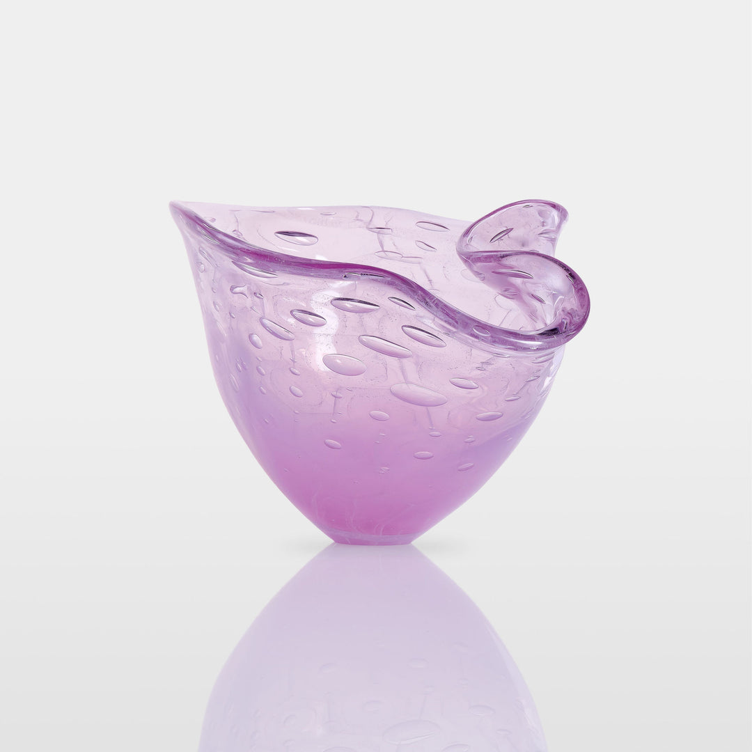 Delicately shaped lilac glass vessel with an organic rim and embossed bubble-like texture, set against a white background with soft reflection.