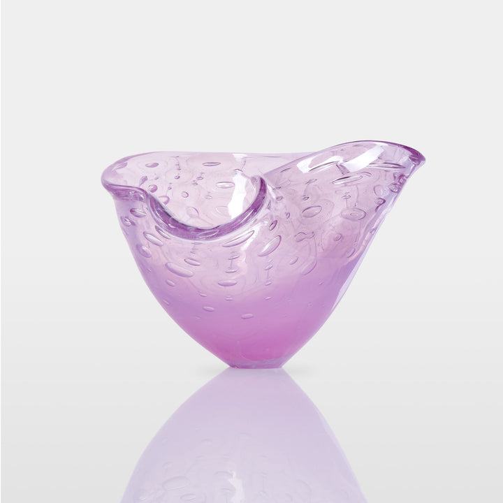 Delicately shaped lilac glass vessel with an organic rim and embossed bubble-like texture, set against a white background with soft reflection.