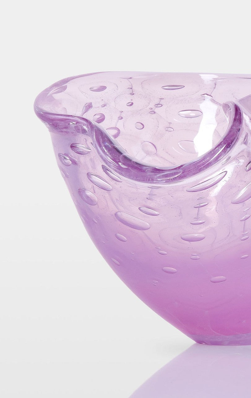 Delicately shaped lilac glass vessel with an organic rim and embossed bubble-like texture, set against a white background with soft reflection.