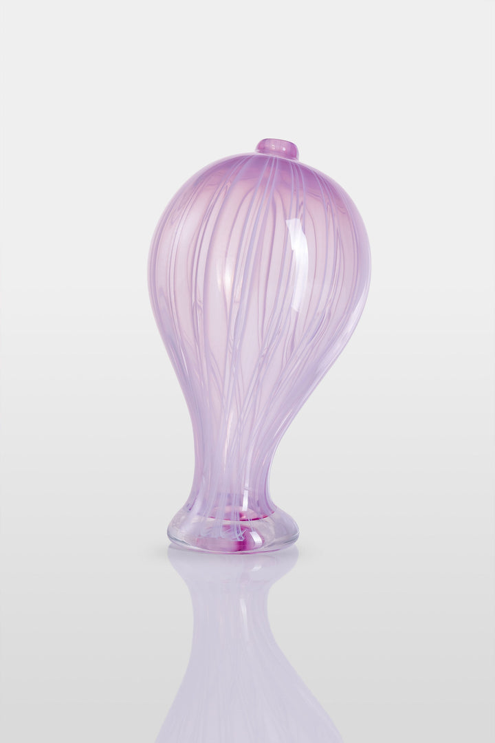 Elegant hand-blown glass sculpture with a balloon-like silhouette and gently tapered base, featuring soft lavender and pink tones with delicate swirling lines throughout.