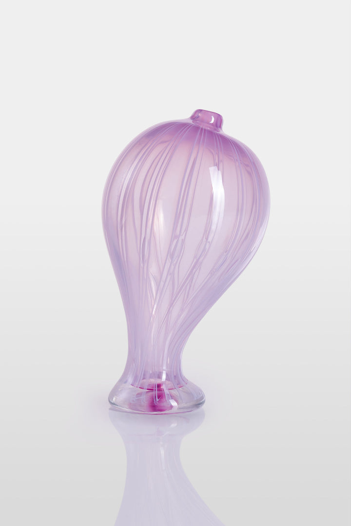 Elegant hand-blown glass sculpture with a balloon-like silhouette and gently tapered base, featuring soft lavender and pink tones with delicate swirling lines throughout.