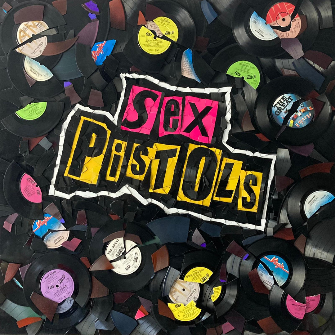 Ed Chapman mosaic artwork featuring the Sex Pistols logo created entirely from destroyed Sex Pistols vinyl records, with fractured black discs and colourful record labels forming a bold punk-inspired composition.