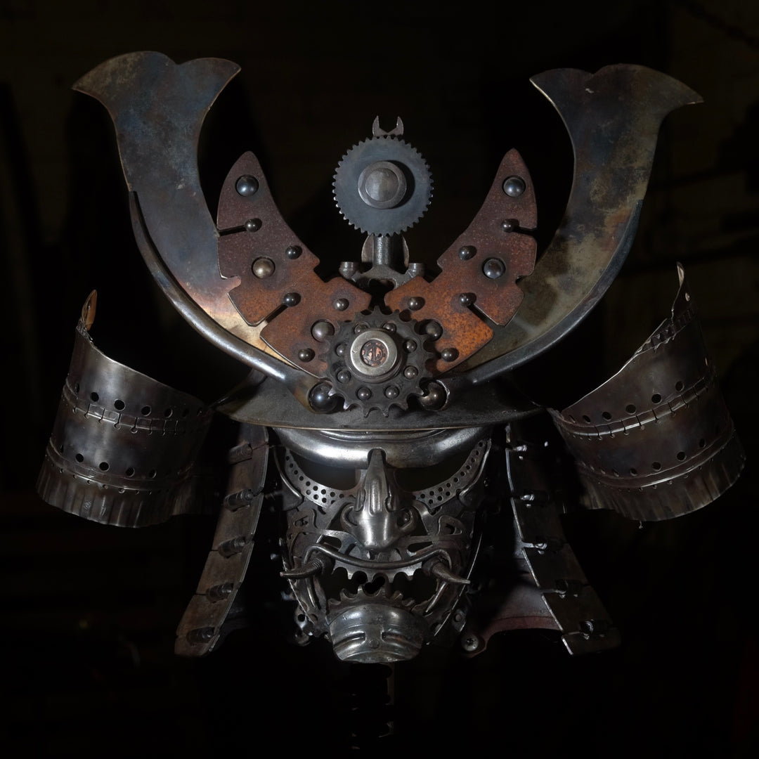 Samurai-inspired helmet sculpture crafted from reclaimed metal with intricate steampunk detailing.